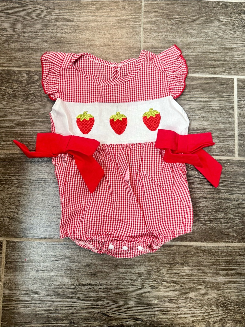 Size 6-12 month strawberry onsie
